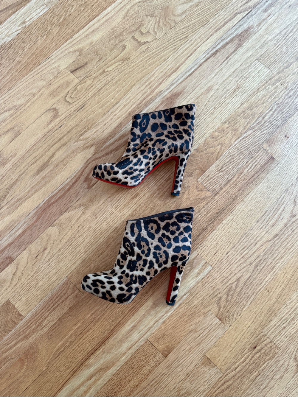Christian Louboutin leopard booties hair texture
